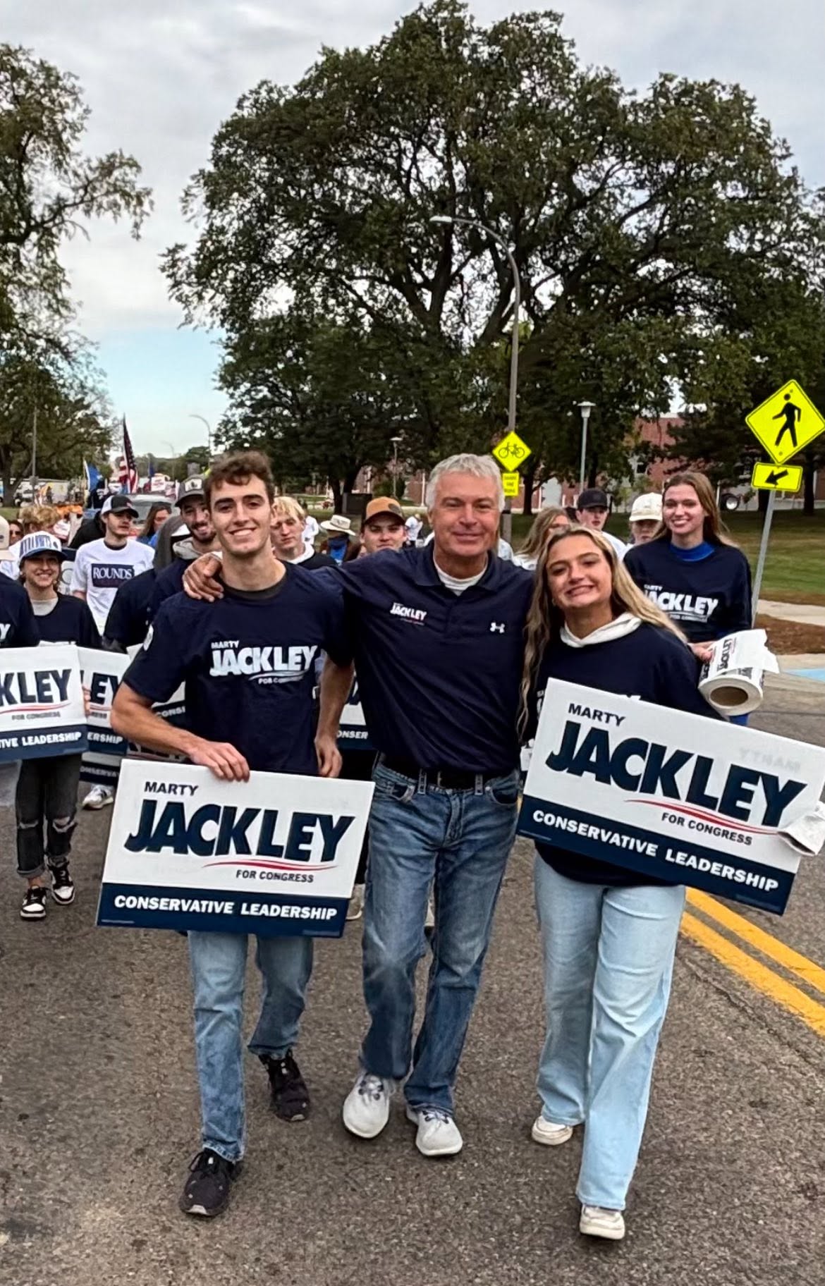 Marty with his kids Michael and Isabella at a parade